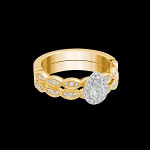 Custom 18kt yellow and white gold vintage-inspired pear diamond halo engagement ring with matching wedding band | Classic. FRIDA | Fine Jewellery.