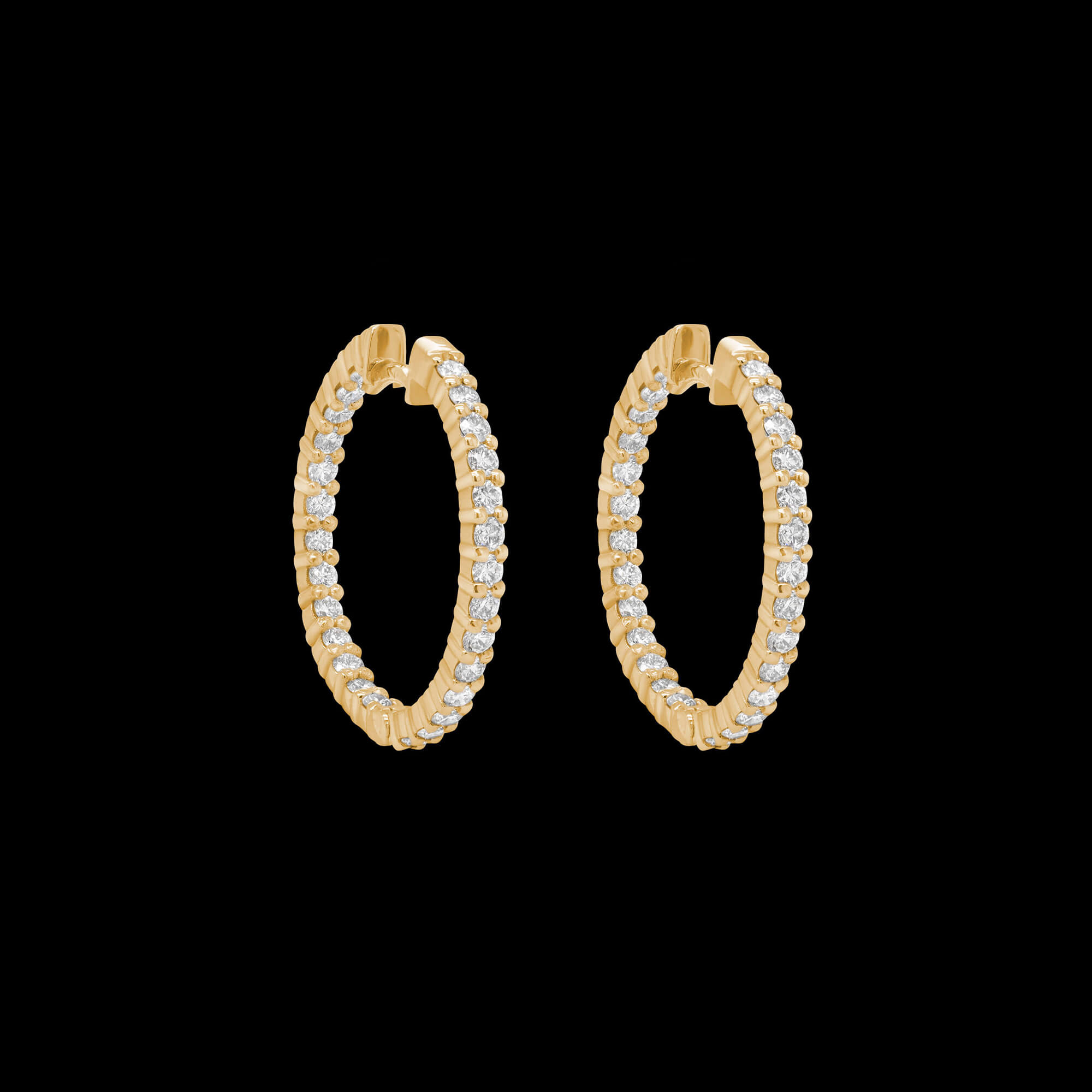 Custom 18kt yellow gold small round hoops with prong-set diamonds. FRIDA | Fine Jewellery.