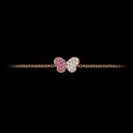 Butterfly bracelet in 18kt white gold set with pink sapphires and white diamonds. Close up. FRIDA | Fine Jewellery.