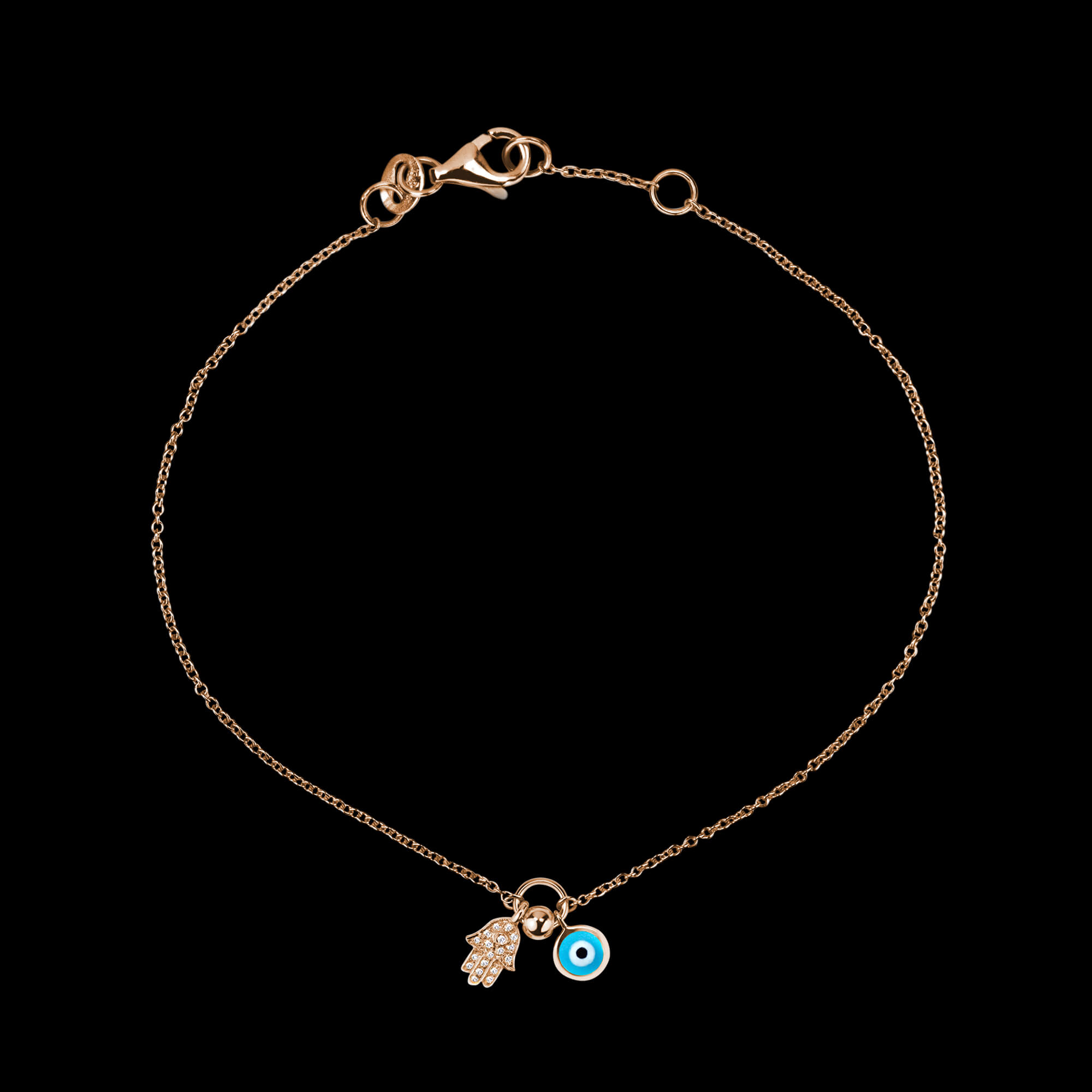 Custom 18kt pink gold hamsa hand and evil eye bracelet set with diamonds and enamel. View 2. FRIDA | Fine Jewellery.