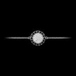 Custom 18kt white gold floating disk bracelet with white and black diamonds. View 2. FRIDA | Fine Jewellery.