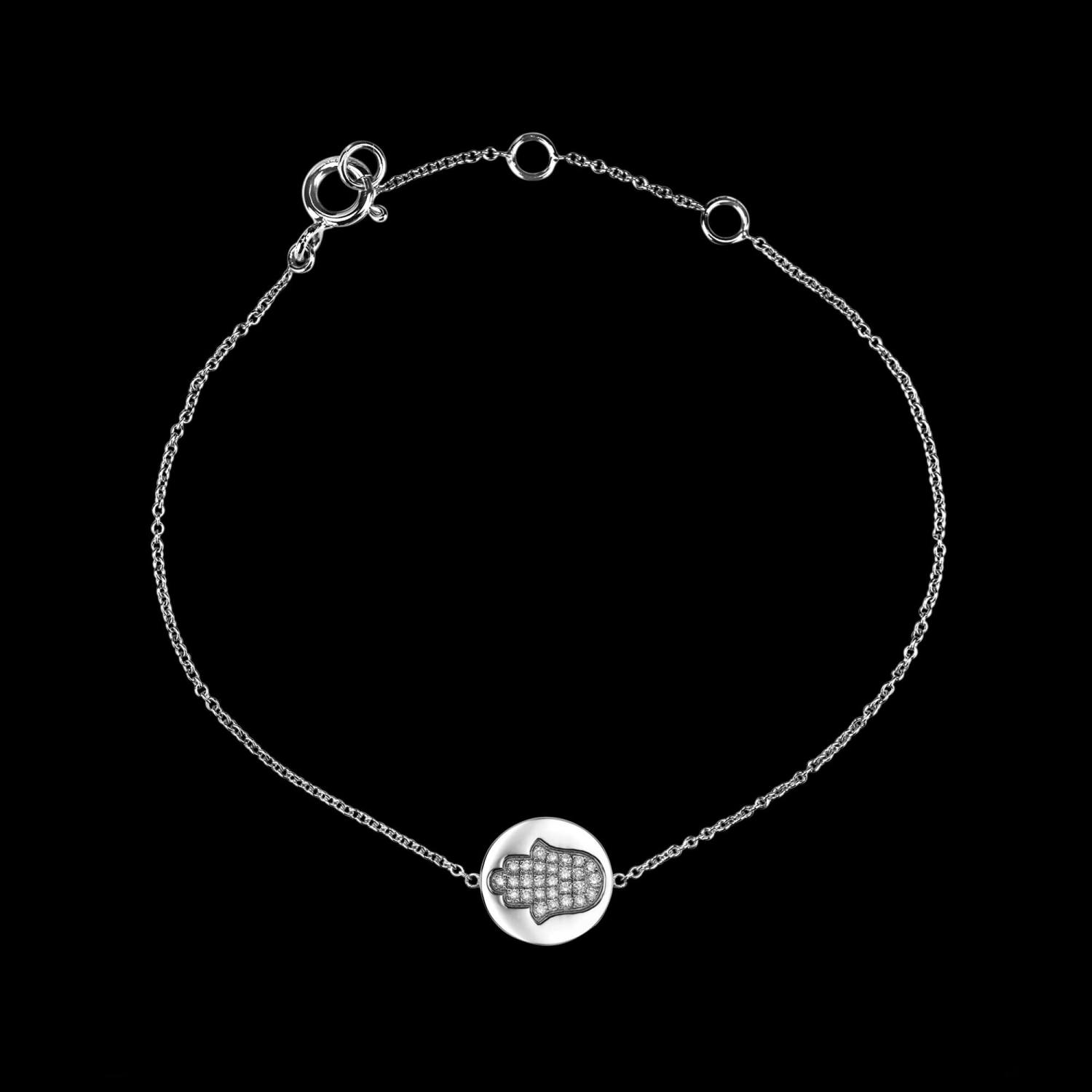 Custom 18kt white gold hamsa hand disk bracelet set with diamonds. View 2. FRIDA | Fine Jewellery.