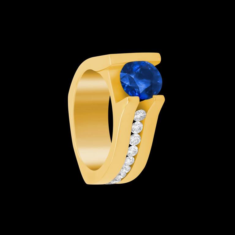 Custom 18kt yellow gold asymmetric solitaire ring with a round blue sapphire and brilliant-cut diamonds | Signature Engagement. FRIDA | Fine Jewellery.