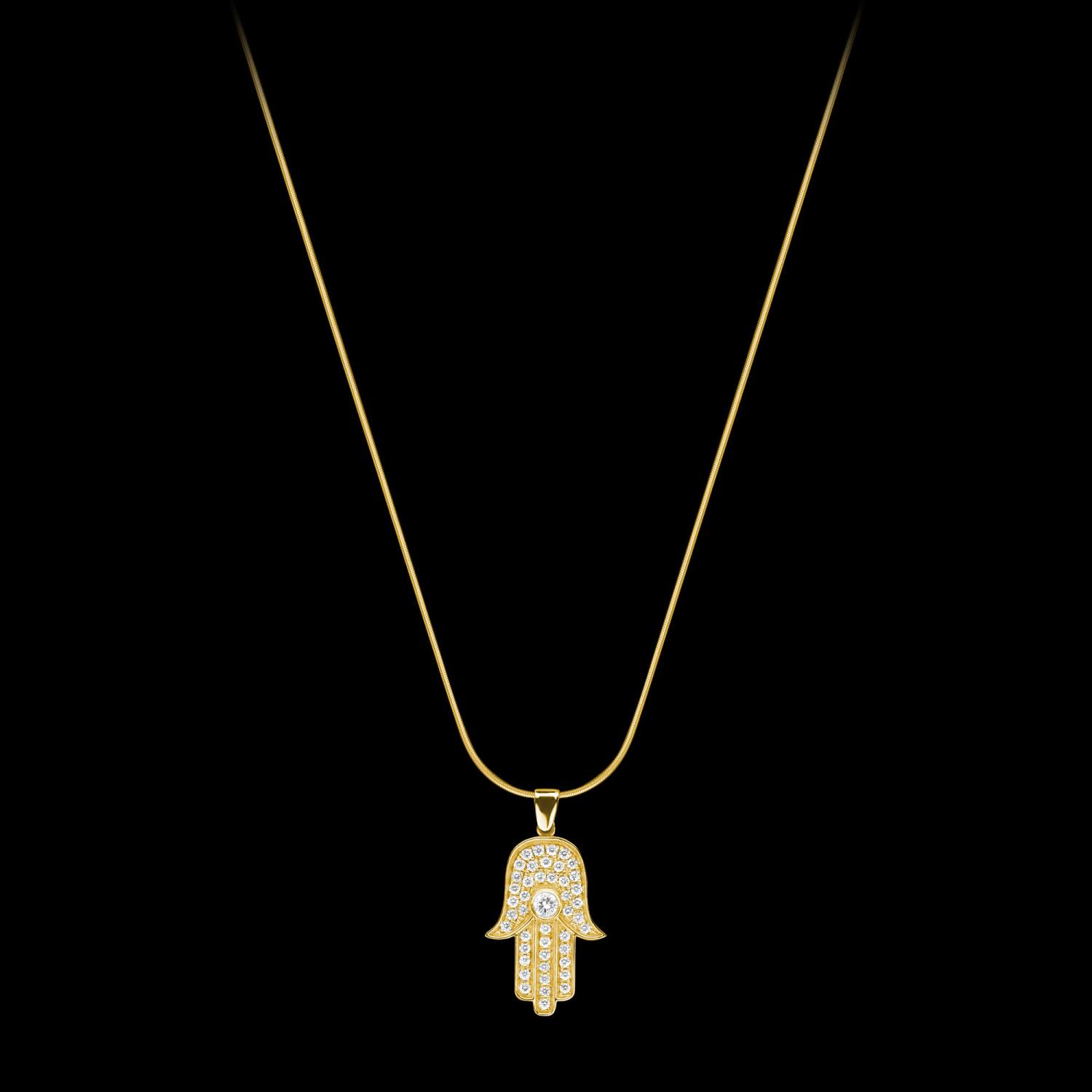 Custom 18kt yellow gold large hamsa hand pendant with diamonds. FRIDA | Fine Jewellery.