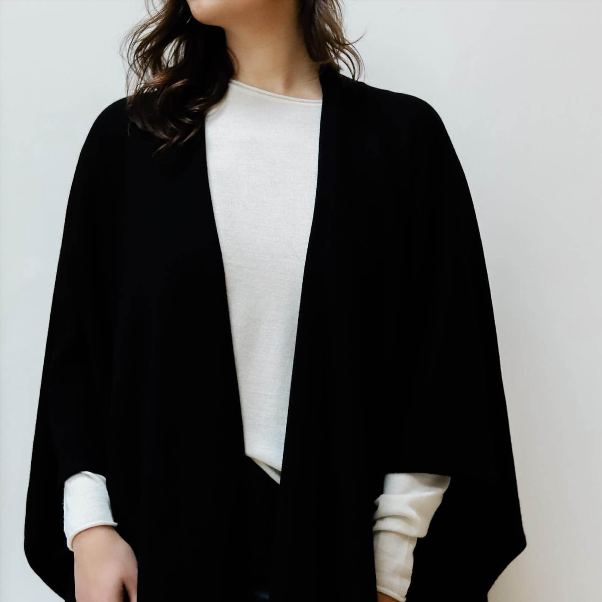 Handmade luxury Himalayan cashmere wrap cape. PAVA Cashmere. Black. FRIDA | Fine Jewellery.
