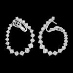Custom 18kt white gold statement diamond swirl hoop earrings. FRIDA | Fine Jewellery.