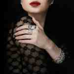 Custom 18kt white luxury statement bracelets and necklaces with diamonds. Model. FRIDA | Fine Jewellery.