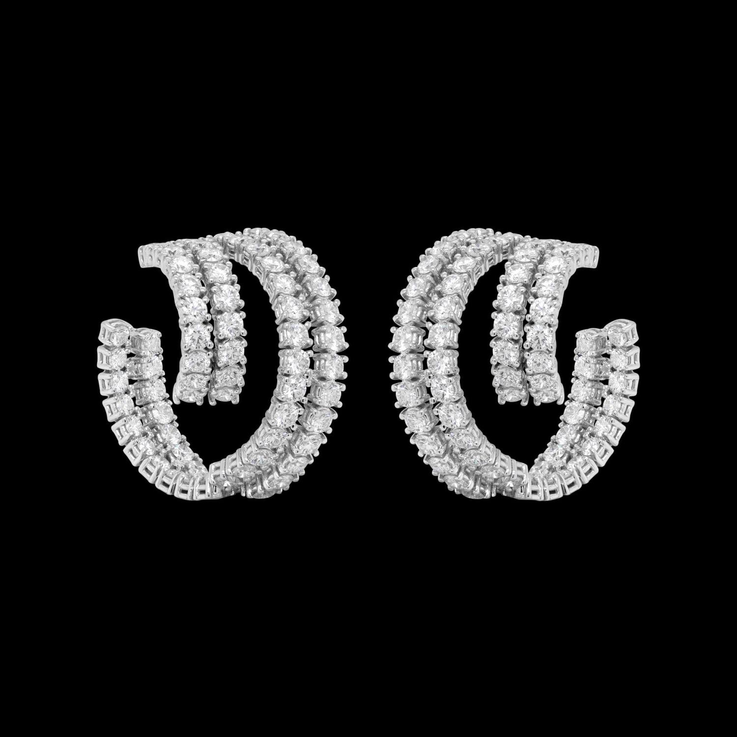 Custom 18kt white statement wrap huggie earrings with diamonds. FRIDA | Fine Jewellery.