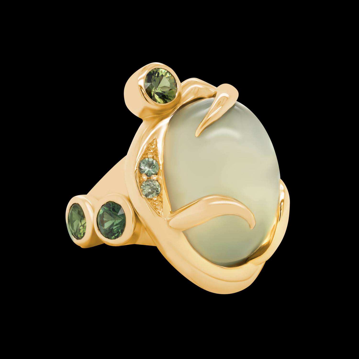 One-of-a-kind 18kt yellow gold statement Èze ring with a moonstone and green sapphires | Shield Collection. FRIDA | Fine Jewellery.