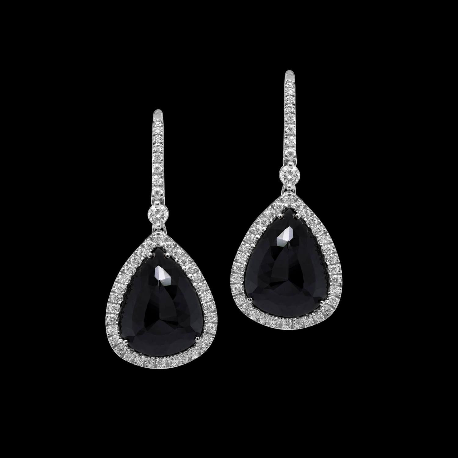 Custom 18kt white gold drop earrings with rose-cut pear black diamonds and round white diamonds. FRIDA | Fine Jewellery.