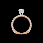 Bespoke 18kt pink and white gold solitaire engagement ring with an oval centre diamond and diamond knife edge shank. Profile | Classic. FRIDA | Fine Jewellery.