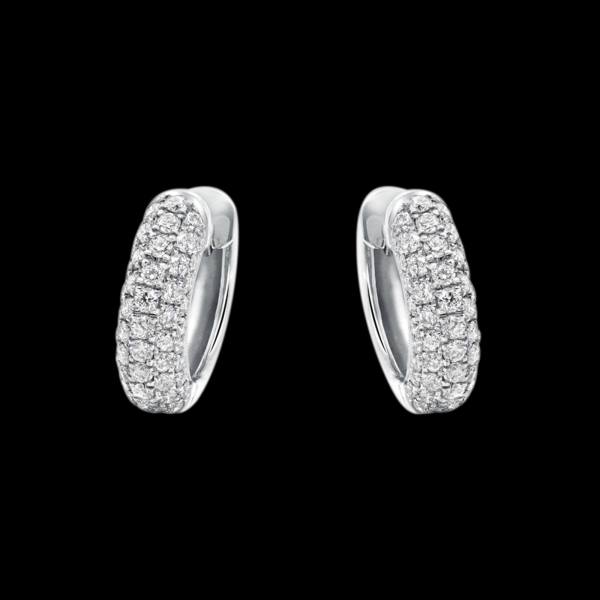 Custom 18kt white gold slim huggie earrings with pave diamonds. FRIDA | Fine Jewellery.