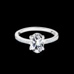 Custom 18kt white gold solitaire with diamonds with prong set oval diamond and diamond shank. Front view. FRIDA | Fine Jewellery.