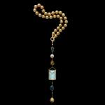 Custom 18kt yellow gold pendant with Karur aquamarine, sapphires, South Sea pearls and brilliant-cut diamonds on golden South Sea pearls. Fine art. FRIDA | Fine Jewellery,
