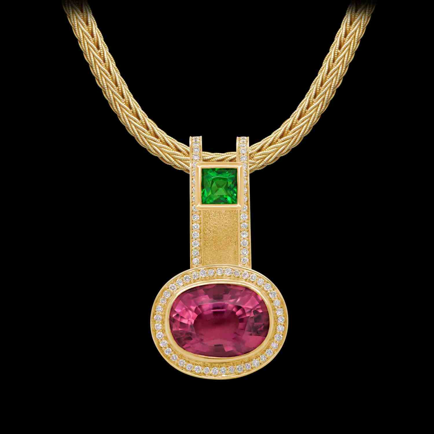 Custom 18kt yellow gold pendant with a pink tourmlaine, tsavorite and diamonds on a gold wheat chain | Shield Collection. FRIDA | Fine Jewellery.