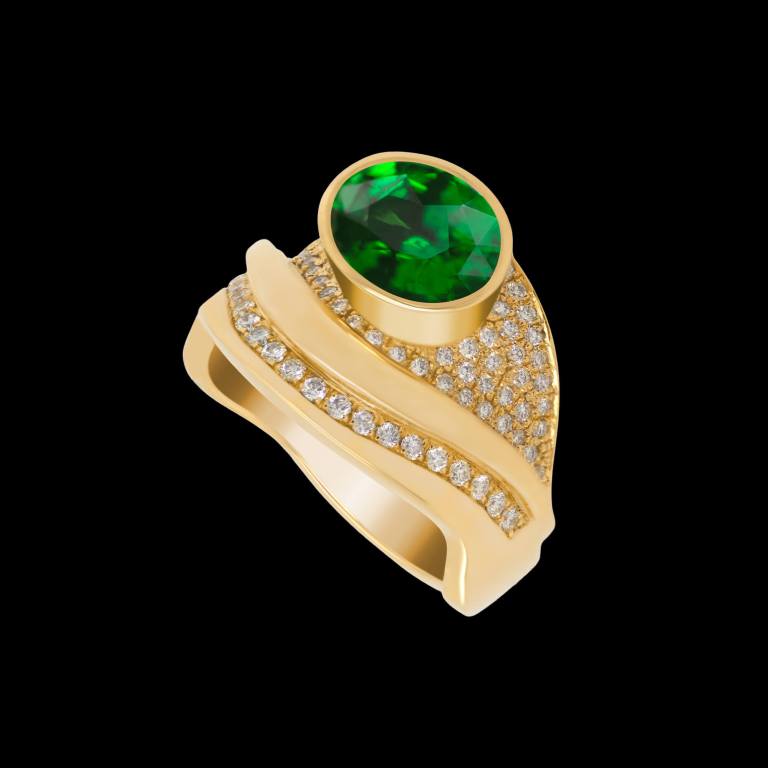 Custom Wave ring in 18kt yellow gold featuring an exquisite 2.86ct oval natural tsavorite garnet (2.36ct) accented by diamonds | Ocean Collection. FRIDA | Fine Jewellery.